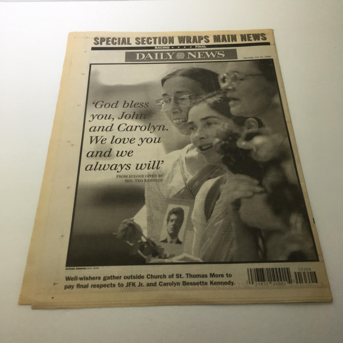 NY Daily News special section cover with a tribute saying, 'God bless you, John and Carolyn. We love you and we always will,' commemorating John and Carolyn Kennedy.