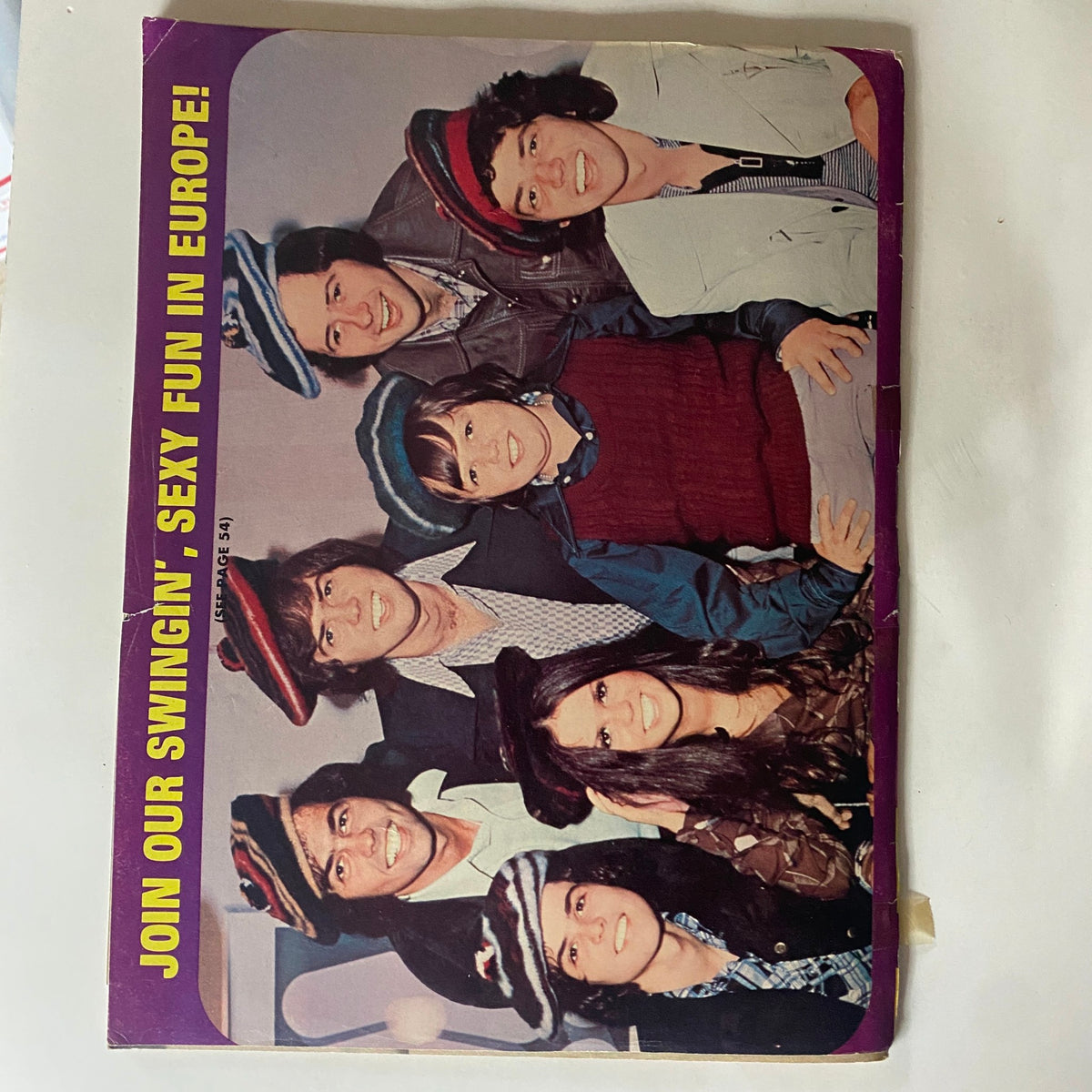 16 Magazine March 1974 cover image depicting a group of celebrities in eclectic hats, highlighting the magazine's appeal to fans of 1970s pop culture.