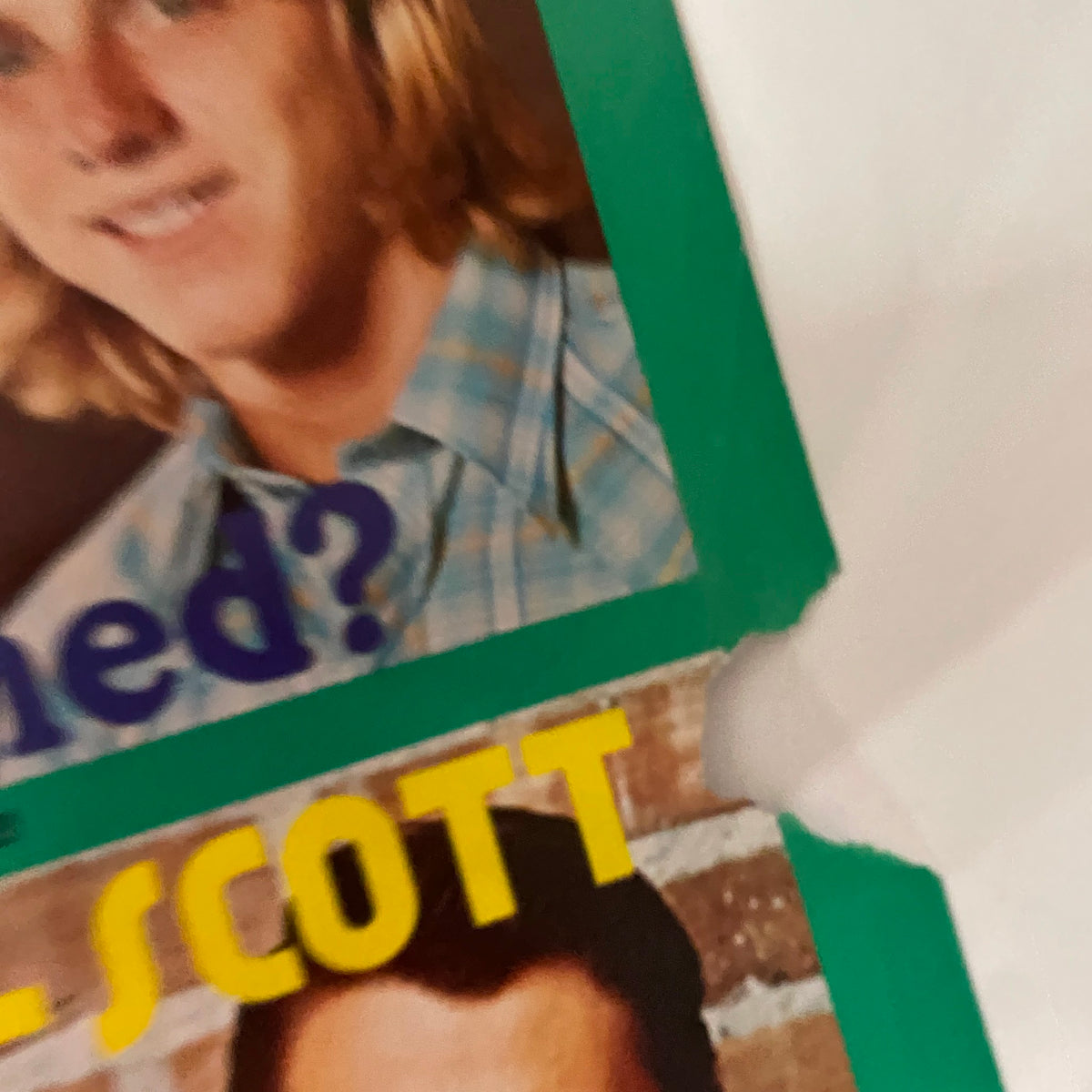 Close-up of the 'Are They Doomed?' section from VTG SPEC Magazine February 1975, highlighting a stylish young man in a plaid shirt from the 70s.