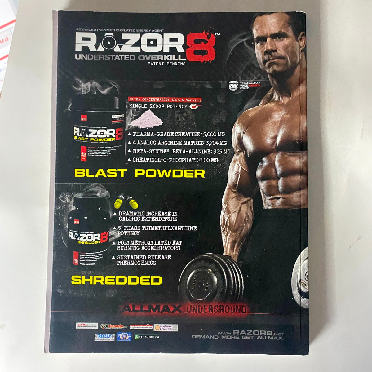 Back cover of Inside Fitness Magazine October 2010 Issue 23 highlighting Razor8 advanced workout supplements with a muscular male model demonstrating strength training.