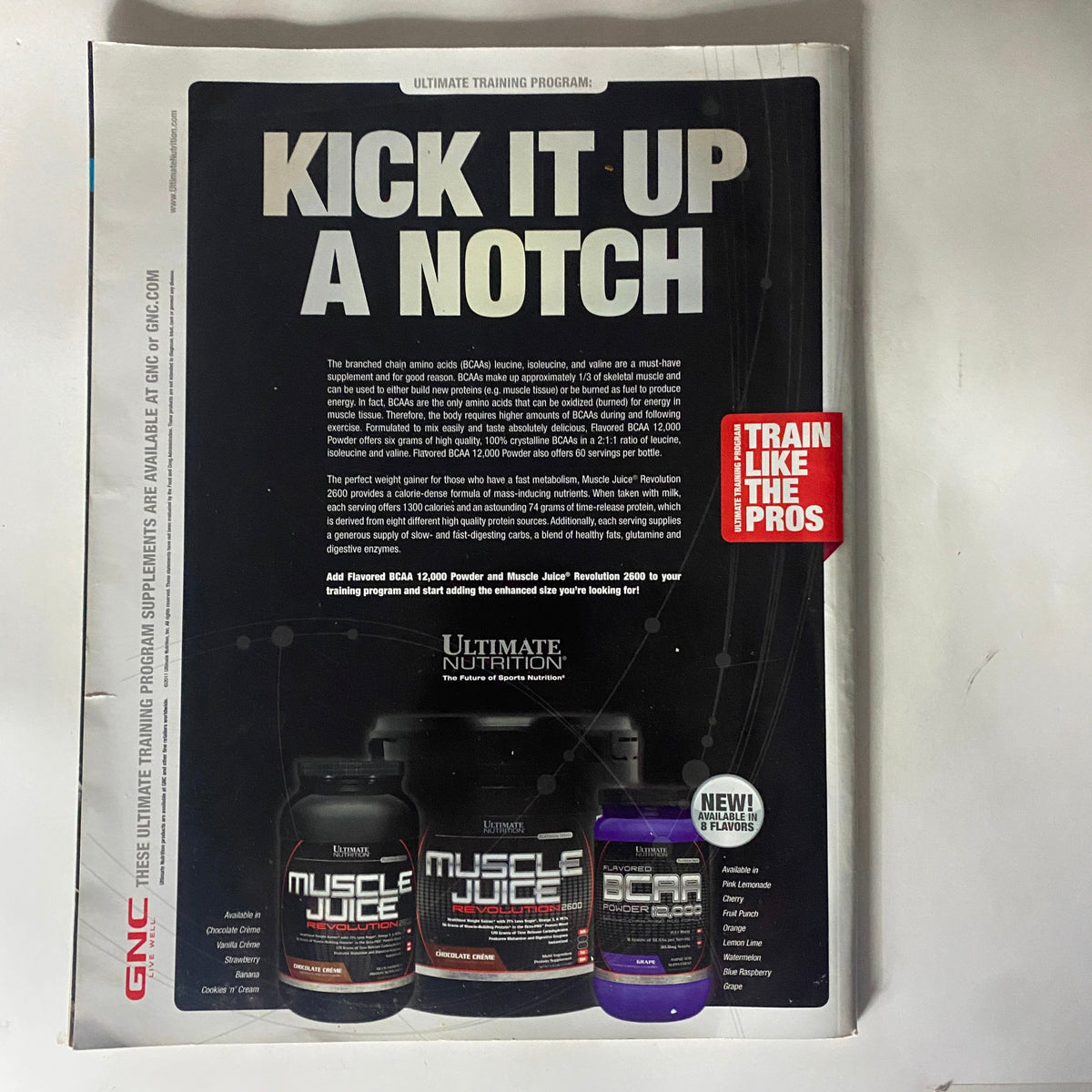 Back cover of Train Hard-Fight Easy Magazine January 2012 promoting GNC Ultimate Training Program with Muscle Juice supplements.