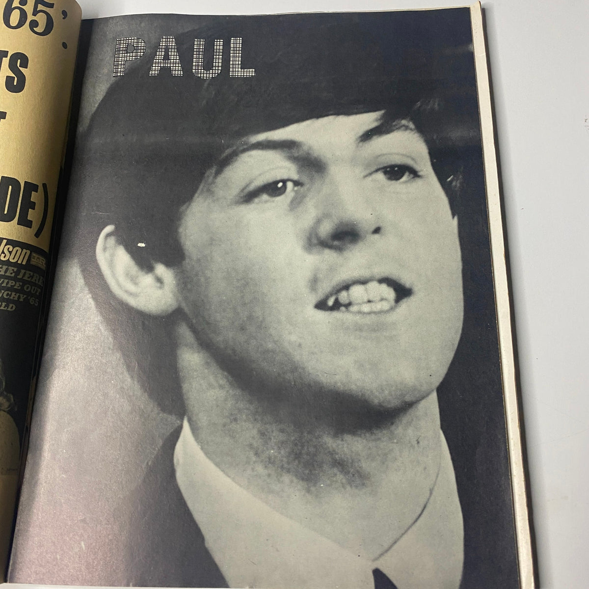Black and white image of Paul McCartney featured in Teen Screen Magazine March 1965, symbolizing Beatlemania.