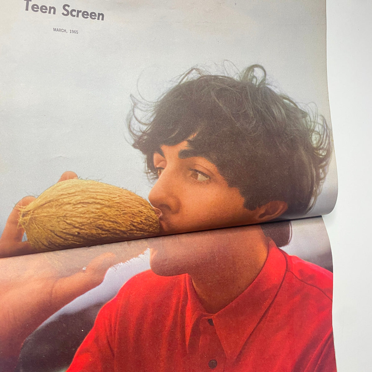 Photo of George Harrison from Teen Screen Magazine March 1965, capturing the essence of the Beatles' influence during the 1960s.