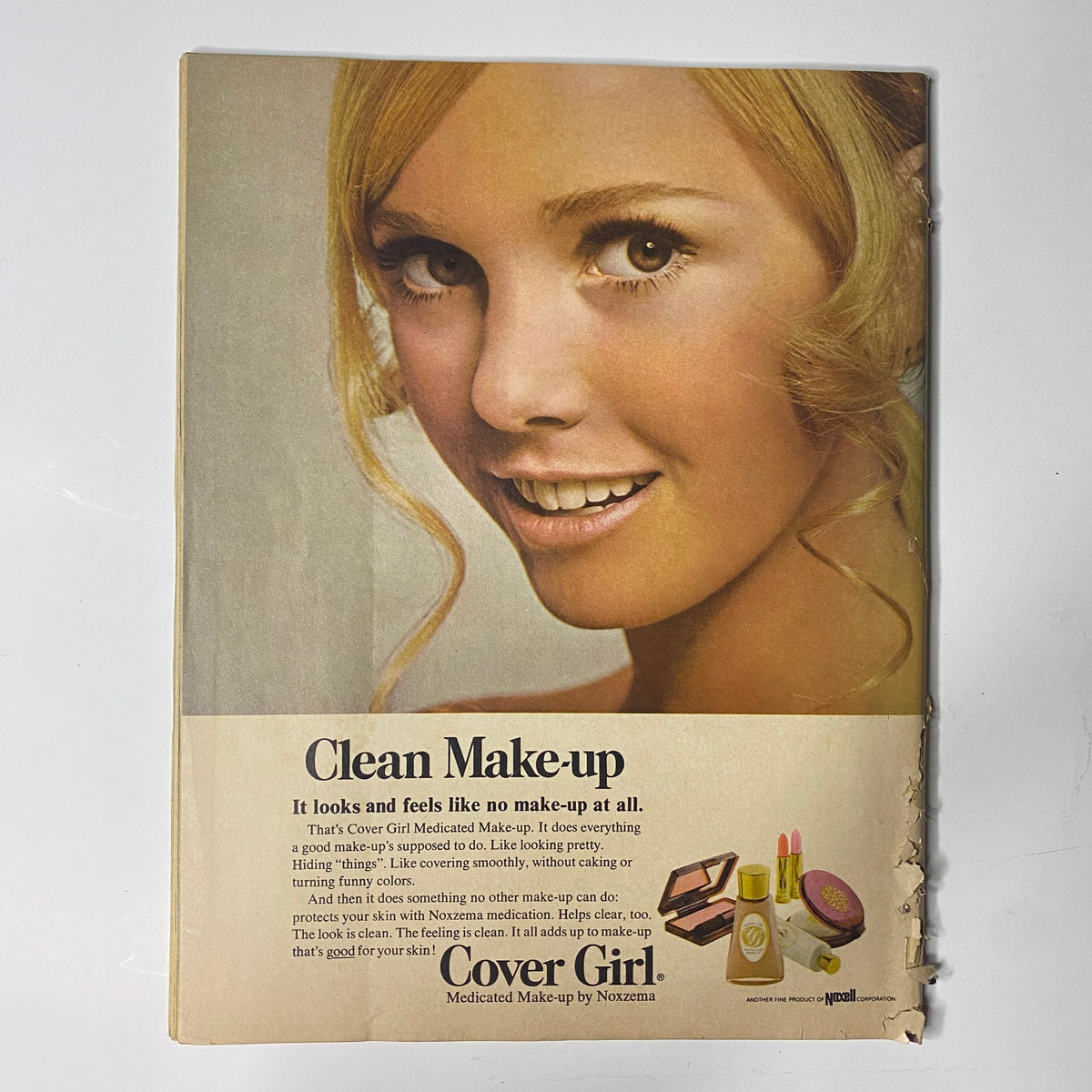 TeenSet Magazine 1968 The Beatles Special - An advertisement for Cover Girl Clean Make-up, showcasing a model with a bright smile, featured in the magazine.