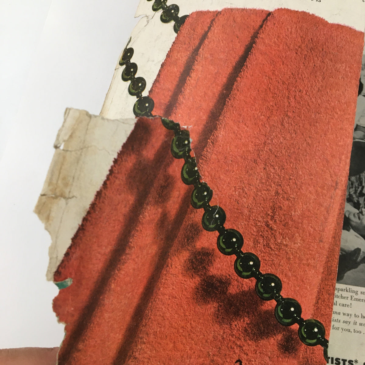 Part of the spine and upper cover of Ladies' Home Journal Magazine December 1948 showing damage and wear, highlighting its vintage condition.