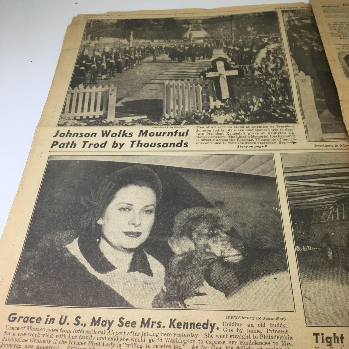 Vintage NY Daily News from November 26, 1963, depicting President Johnson walking in mourning alongside a procession at the funeral of JFK. The image includes a grieving crowd and highlights the presence of dignitaries and citizens paying their respects.