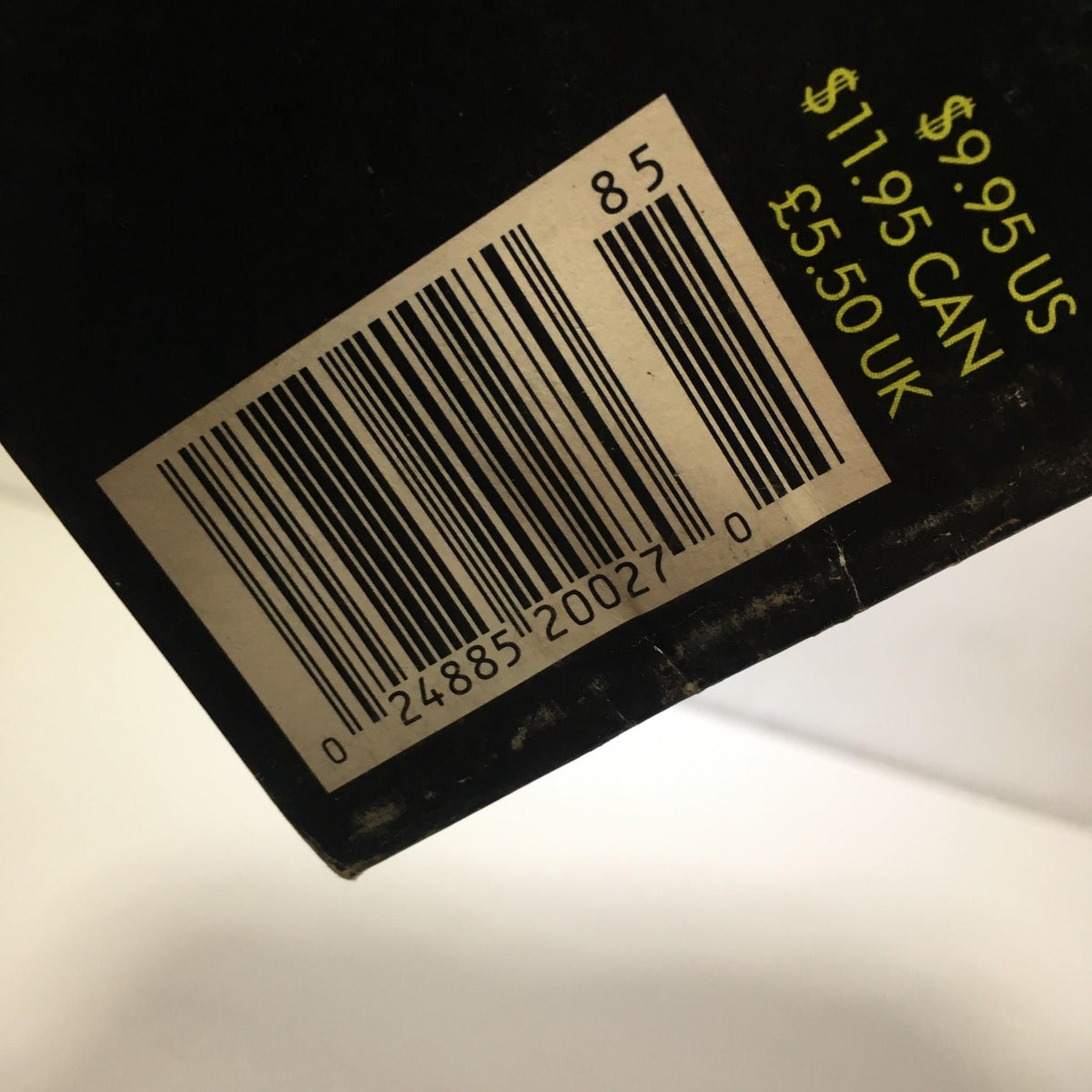Barcode and pricing details on the back cover of Stan Lee Presents: The Sensational She-Hulk magazine, including price points.