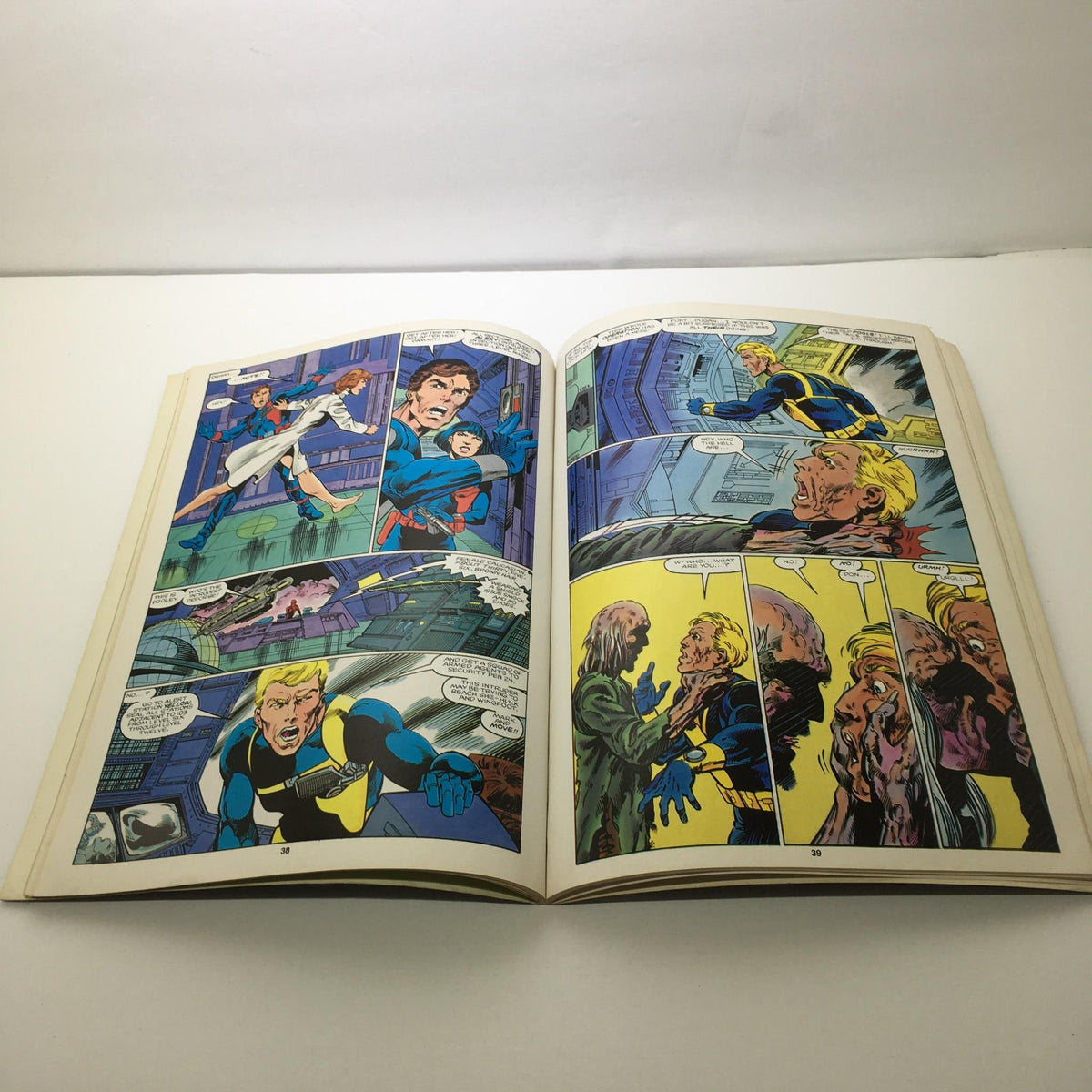 Pages of 'Stan Lee Presents: The Sensational She-Hulk Magazine' open, featuring vibrant comic book illustrations and narratives.