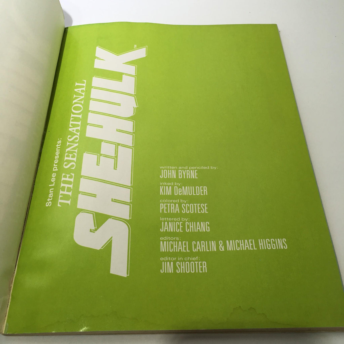The interior page of 'Stan Lee Presents: The Sensational She-Hulk' showcasing the credits and contributors to the comic including writer John Byrne and editor Jim Shooter.