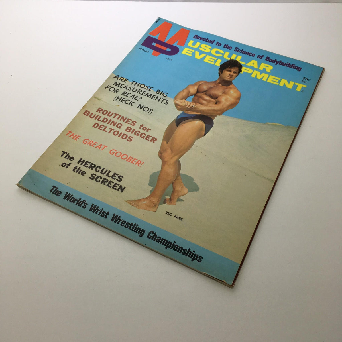 Another view of the Muscular Development August 1972 cover featuring Reg Park, emphasizing bodybuilding routines and wrestling championships.