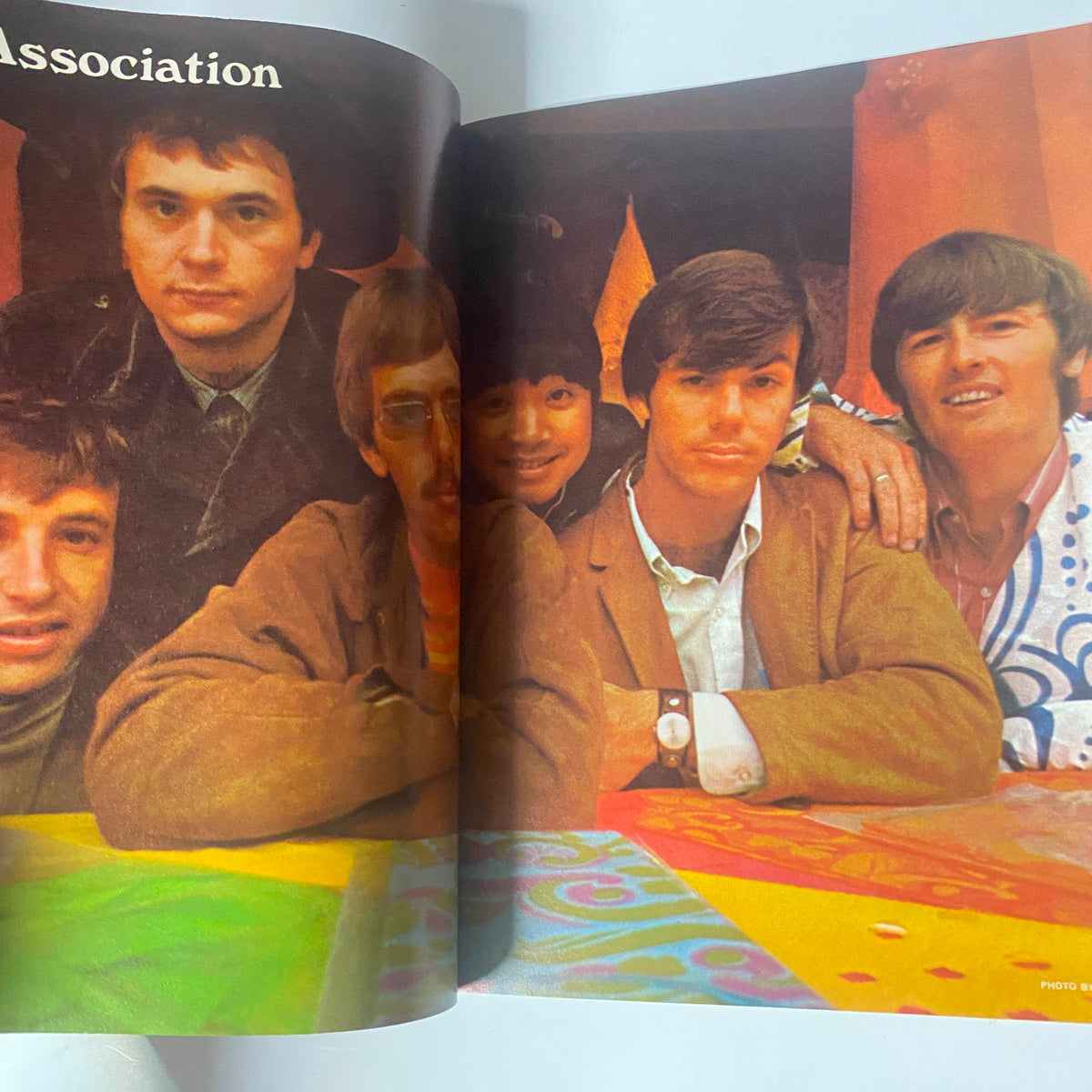 Group photo from Teen Set Magazine November 1967 featuring members of The Association, a popular band from the 1960s, showcasing the vibrant youth culture of the era.