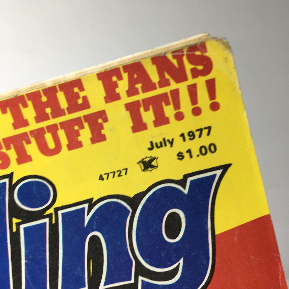 Close-up of the top section of Inside Wrestling Magazine - Victory Sports Series July 1977, highlighting the title and month of publication, featuring the iconic Dusty Rhodes.