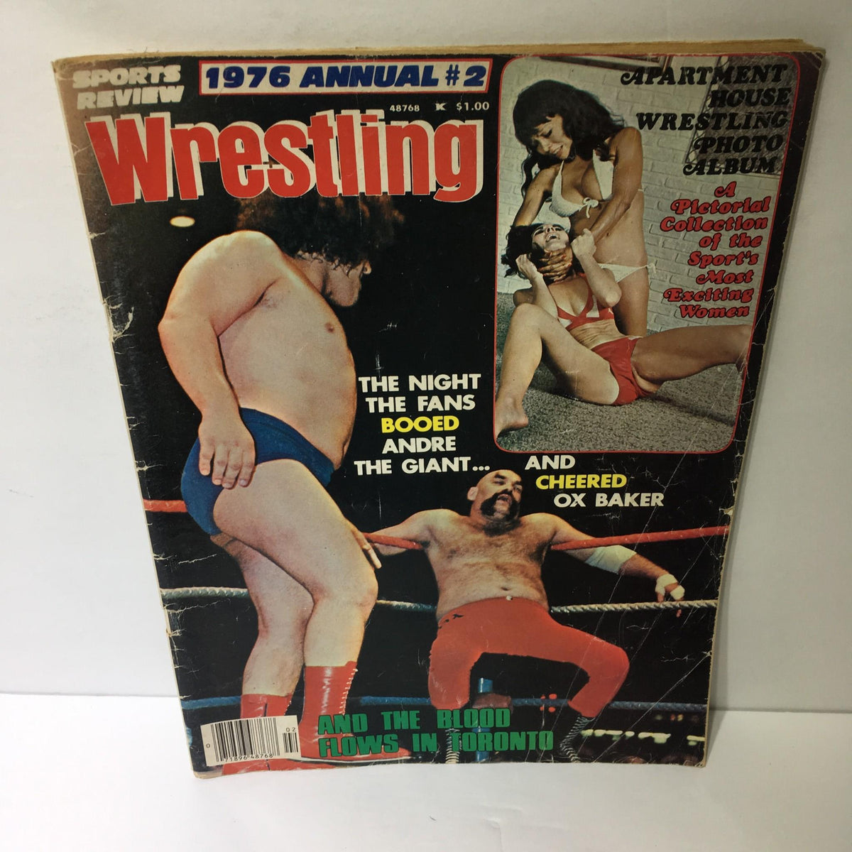 Cover of Wrestling 1976 Annual #2 featuring Andre the Giant and Ox Baker, showcasing wrestling action in a ring.
