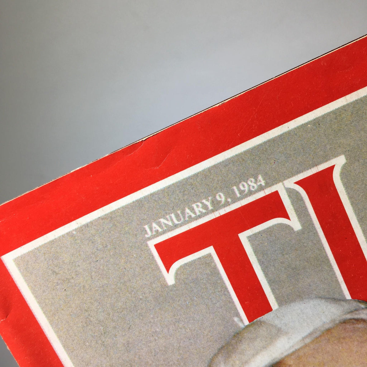 Top view of Time Magazine January 9, 1984, highlighting the date and title 'Why Forgive? The Pope Pardons The Gunman'.