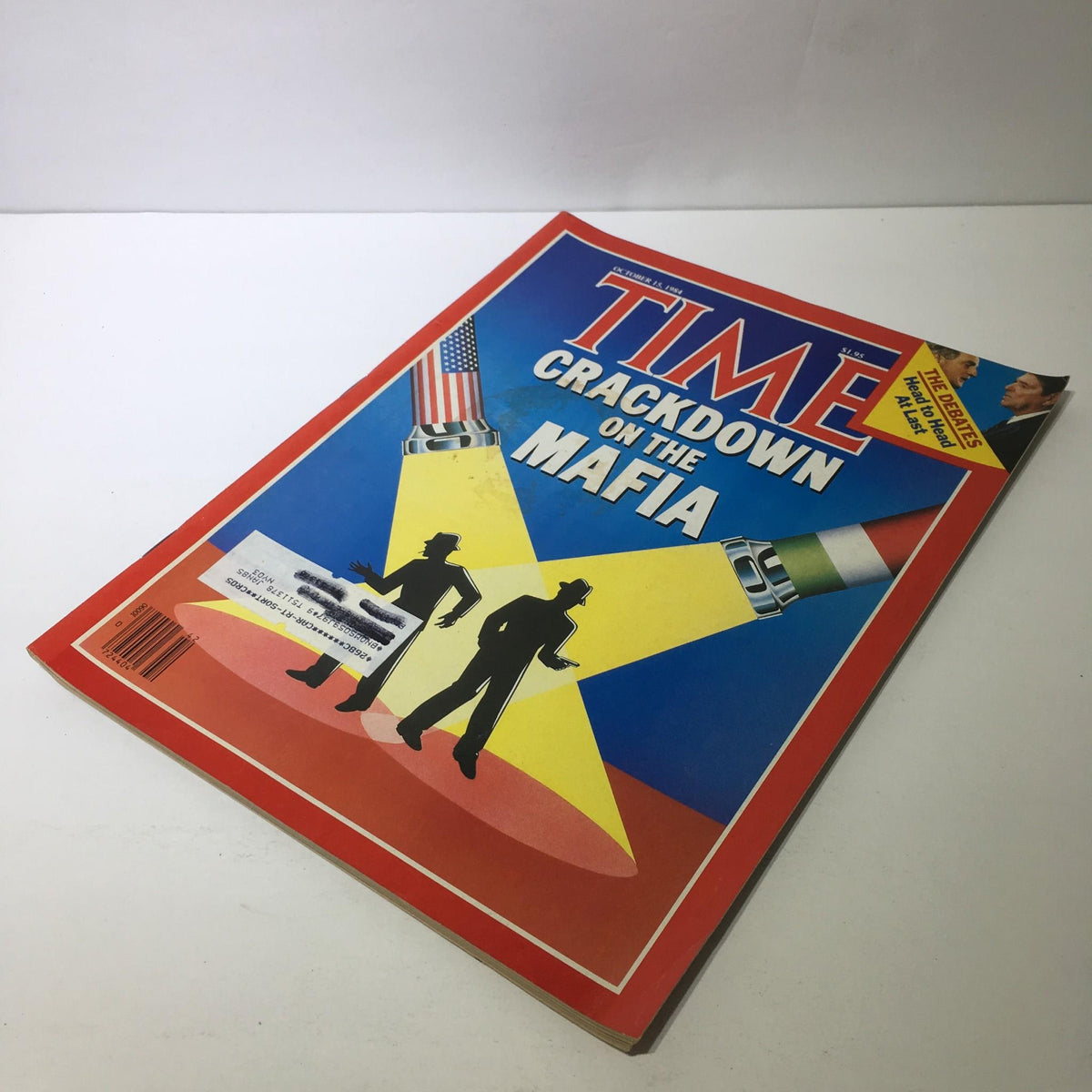 Time Magazine cover from October 15, 1984, featuring the title 'Crackdown on the Mafia' with vibrant artwork showing silhouetted figures, spotlights, and elements symbolizing law enforcement and crime.