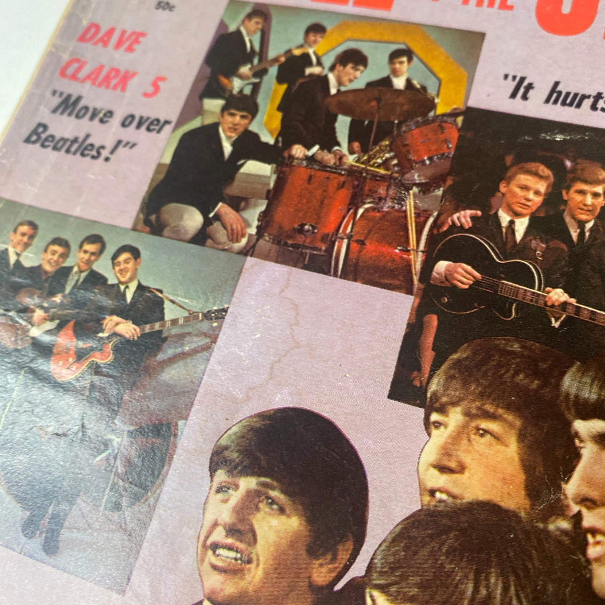 Close-up of Modern Annual Magazine 1964 Vol 1 No. 1 cover featuring The Beatles, with promotional text discussing The Dave Clark Five and the excitement surrounding the rivalry with the Beatles.