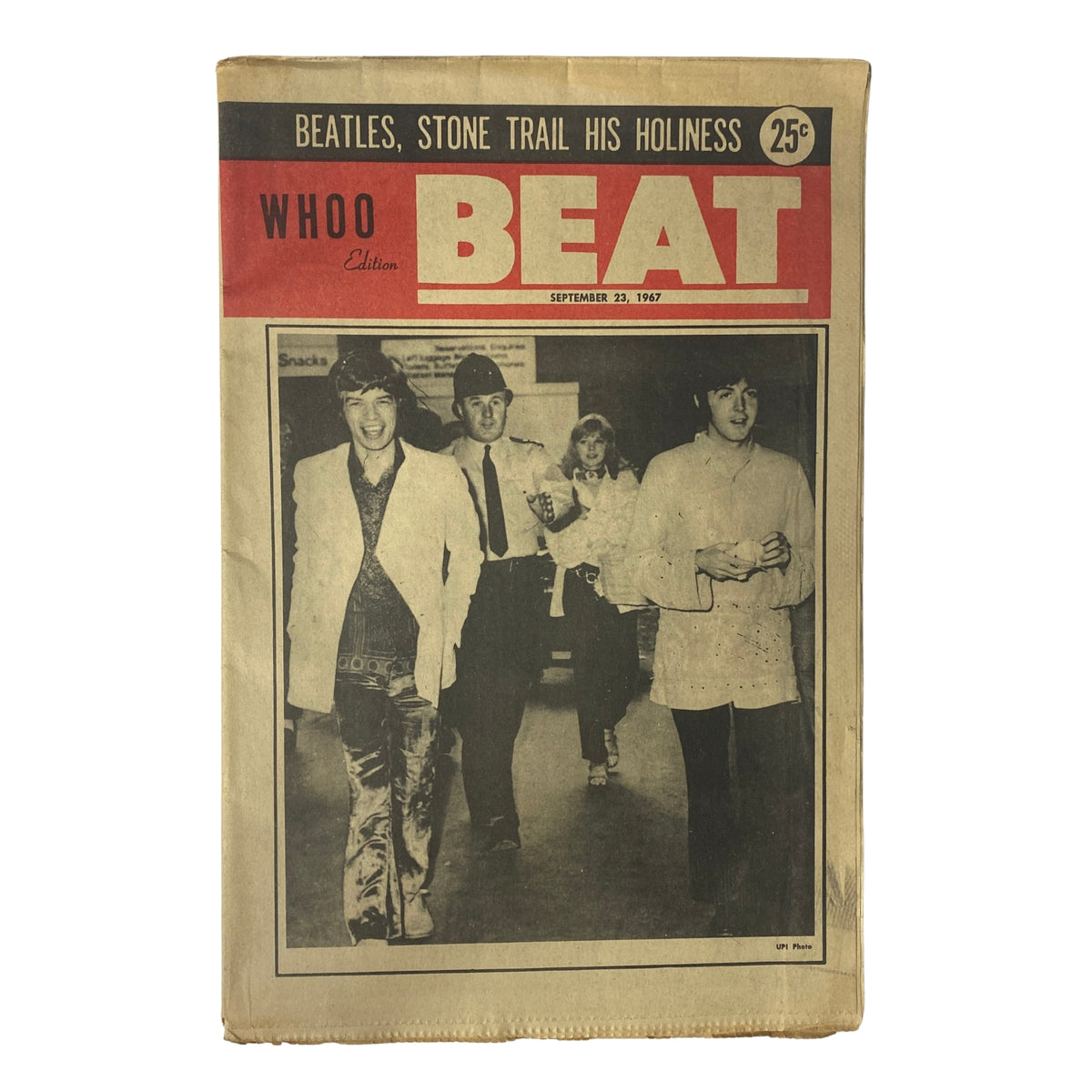 Cover of Whoo Beat Tabloid Magazine from September 23, 1967 featuring an image of The Beatles walking together, highlighting the cultural essence of the late 1960s music scene.