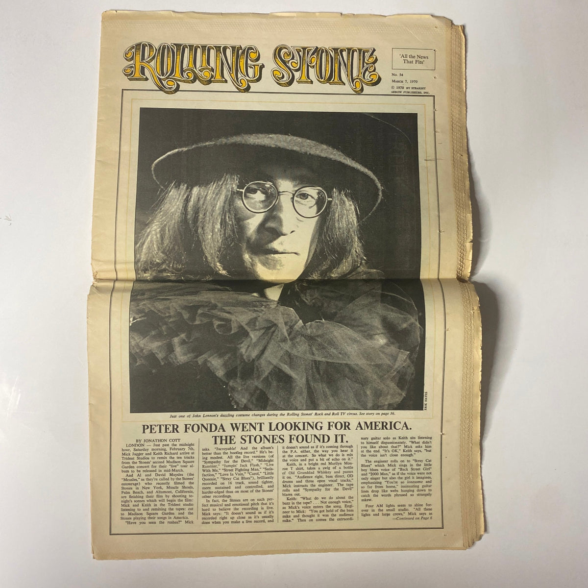 Interior page from Rolling Stone Magazine March 19, 1970 No. 54 with a portrait of a musician in glasses, accompanied by an article titled 'Peter Fonda Went Looking for America. The Stones Found It.'