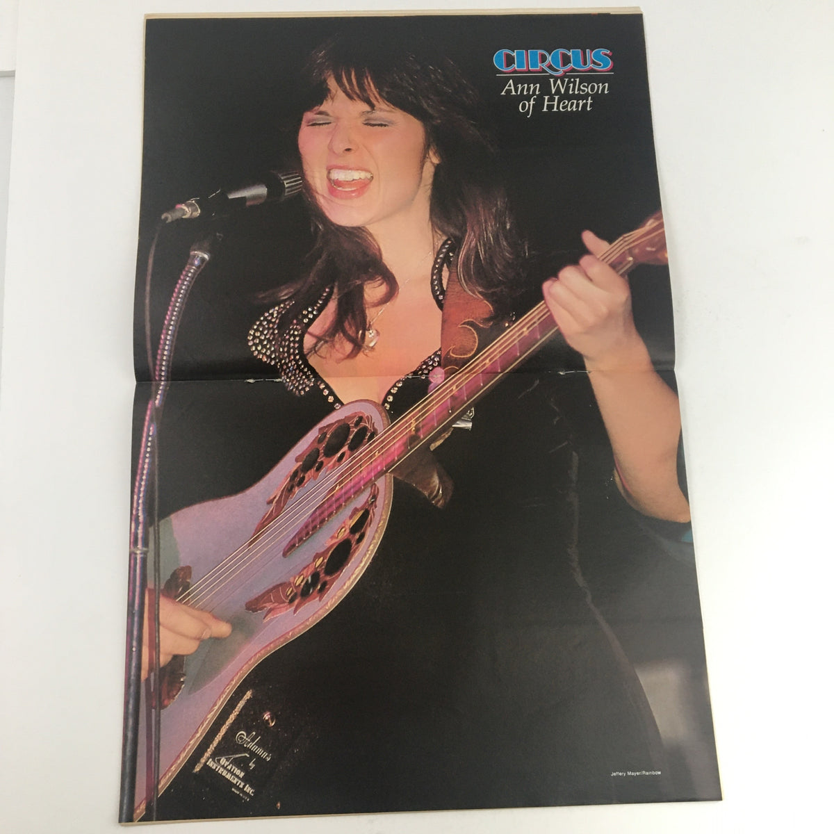 Circus Magazine December 12 1978 cover featuring Ann Wilson of Heart performing with her instrument. This vintage magazine showcases iconic rock artists and includes a unique poster, appealing to collectors and music enthusiasts.