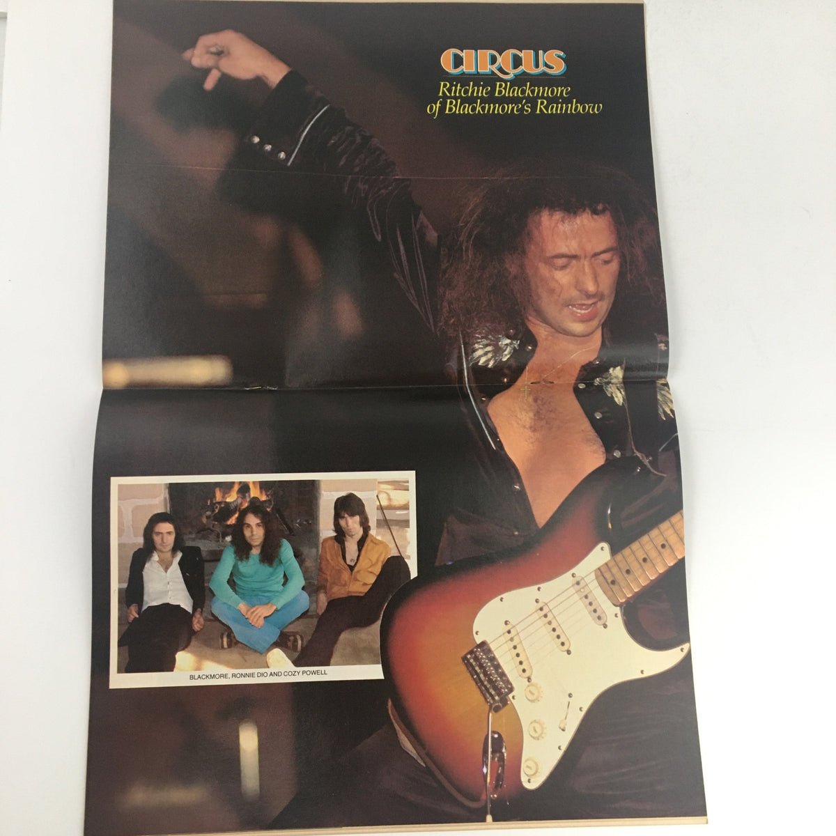 Ritchie Blackmore of Blackmore's Rainbow featured in Circus Magazine August 4 1977, showcasing his electrifying performance, a must-see for classic rock fans.