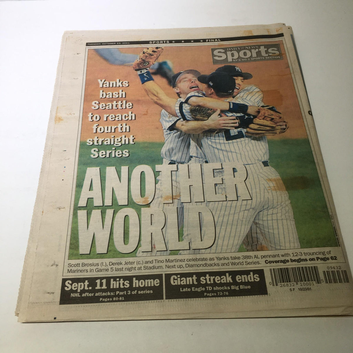 NY Daily News sports section highlighting the Yankees celebrating their win against Seattle to reach the World Series, titled 'Another World'.