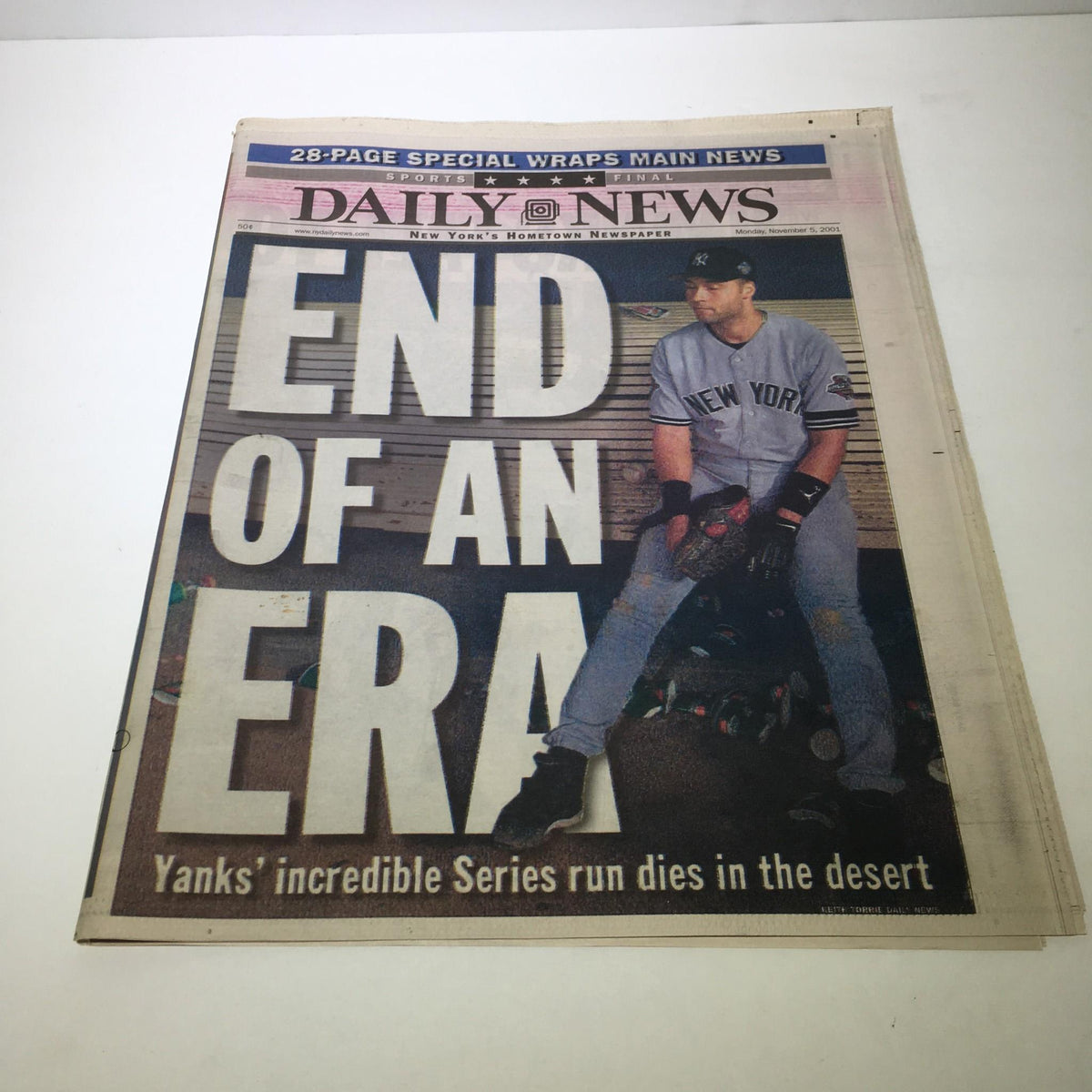 Cover of NY Daily News issue dated 11/5/01 titled 'End of An Era: Yanks Incredible Series Run Dies in Desert'. Features a baseball player in a Yankees uniform.