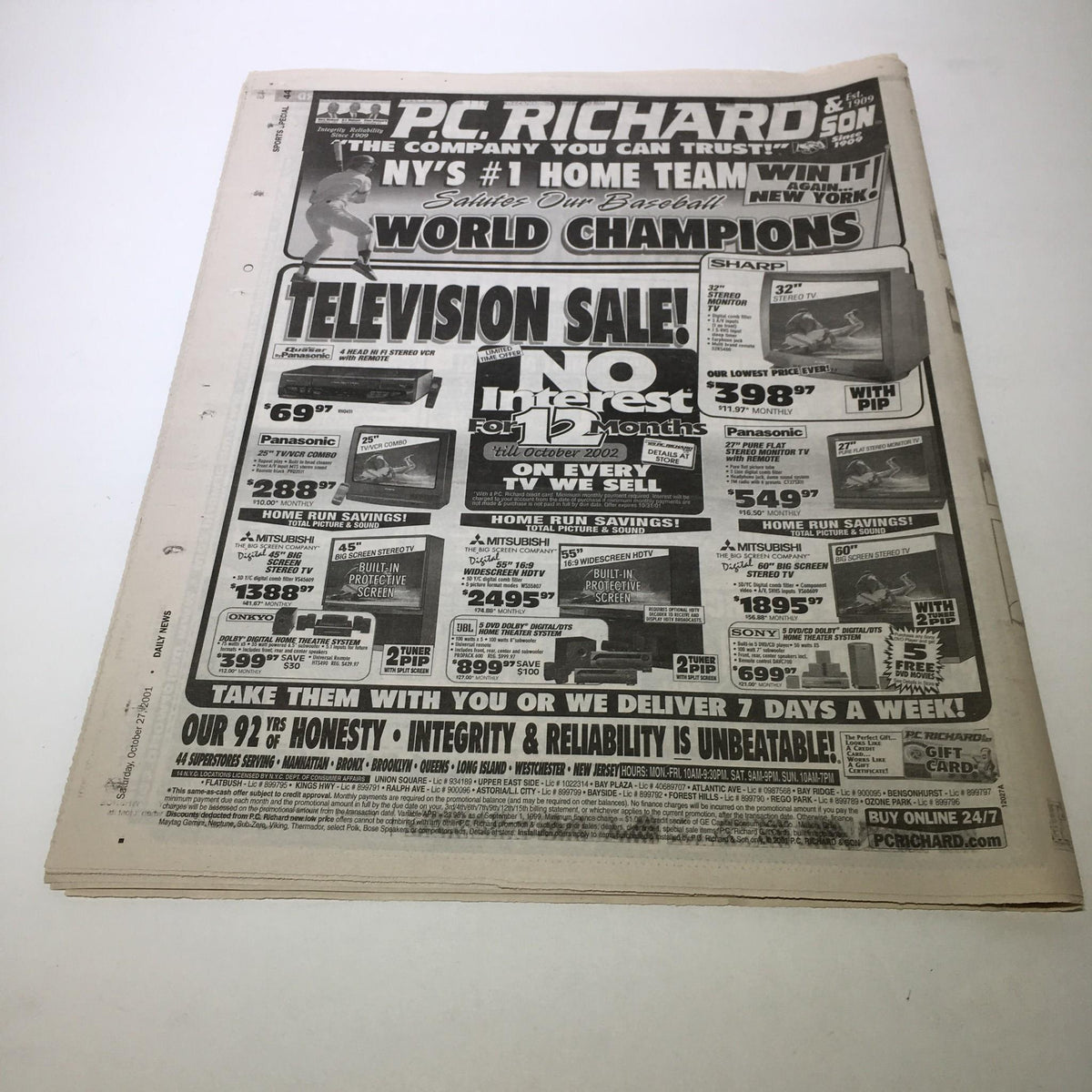 Advertisement page from NY Daily News, October 27, 2001, showcasing a television sale from P.C. Richard & Son, highlighting the title 'NY Daily News: Oct 27 2001 Yanks Taking Series All But A FourGone Conclusion'.