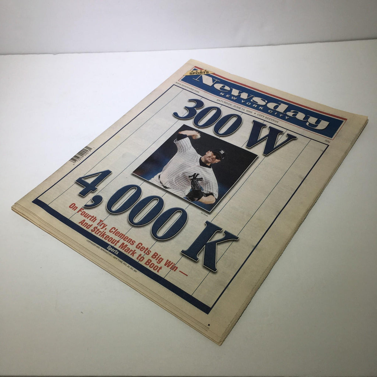 Front cover of Newsday featuring the headline '300 W 4,000 K' alongside a photograph of a baseball player, celebrating Clements' significant win and strikeout milestone.