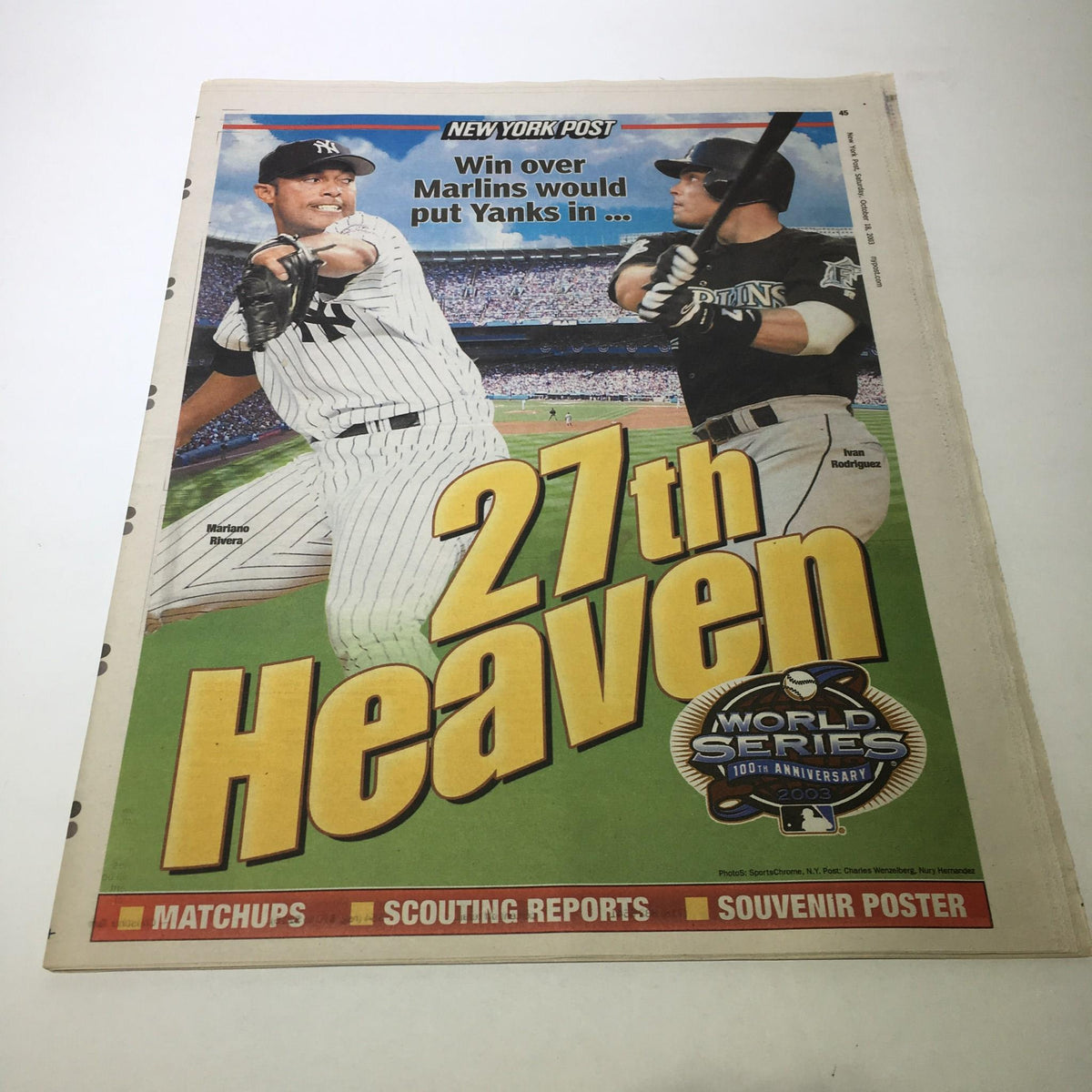 New York Post cover featuring the title 'Win Over Marlins Would Put Yanks In 27th Heaven', showcasing two baseball players in action with vibrant stadium background, October 18, 2003.