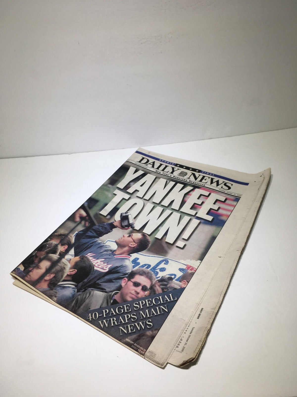 Another view of NY Daily News from October 31, 2000 with the prominent headline 'YANKEE TOWN!' depicting enthusiastic fans.