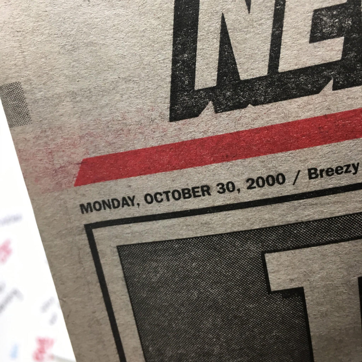 Close-up of the New York Post dated October 30, 2000. The date is prominently displayed alongside the title 'Toast of the Town', referencing the city's tribute to championship athletes.