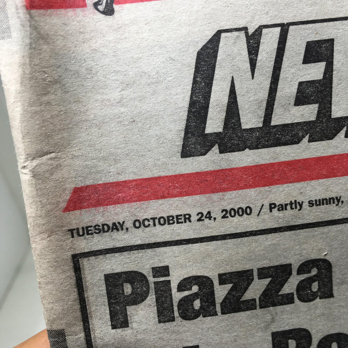 New York Post from October 24, 2000, showing the date and heading 'Piazza Rips Into Rocket Bleep Show' with details of the day's weather.