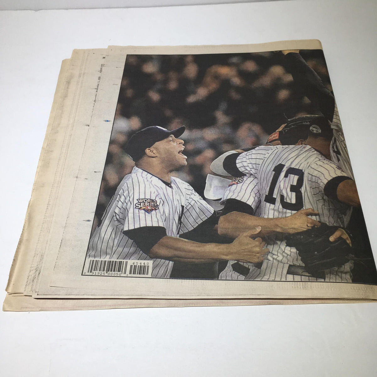 Back cover of the New York Post from Nov 5, 2009, showcasing the celebration of Yankees players after their World Series victory.