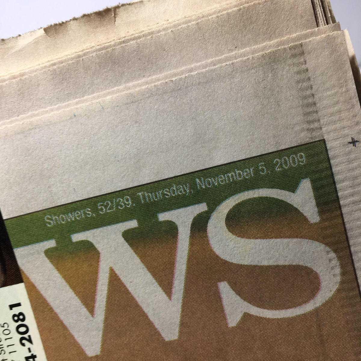 Close-up of the date and weather details on the front page of the New York Daily News: Nov 5, 2009 Special Edition 27th Heaven, indicating November 5, 2009.