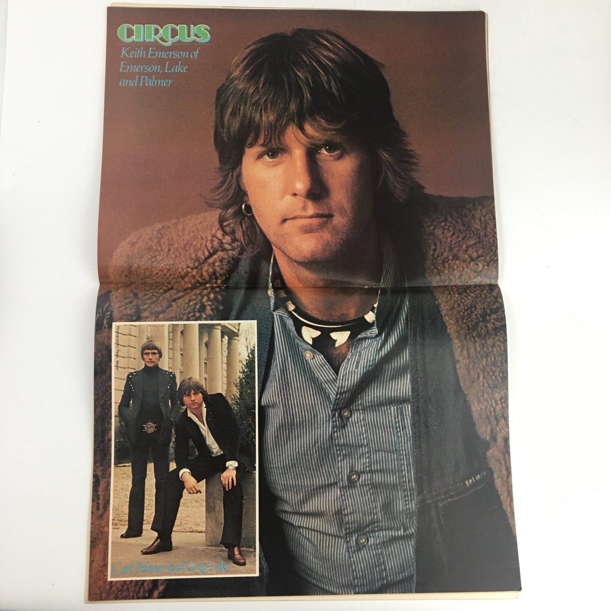 Keith Emerson of Emerson, Lake and Palmer featured in Circus Magazine May 26 1977. The image shows Emerson in a stylish outfit, capturing the essence of classic rock culture.