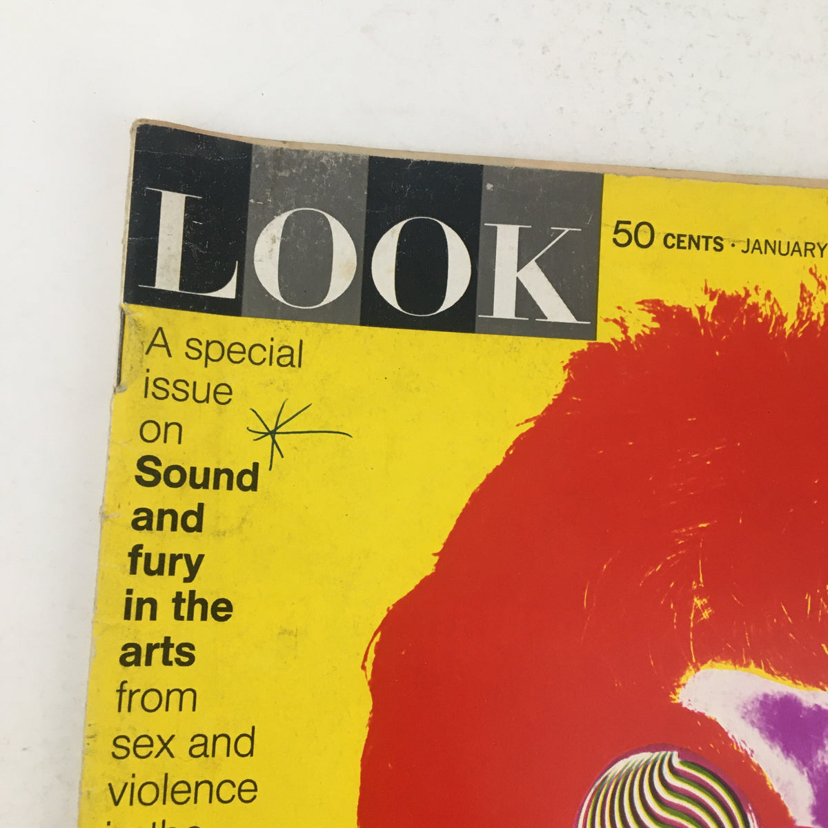 Close-up view of the Look Magazine January 9, 1968 cover showing the title and a bright illustration of John Lennon's face.