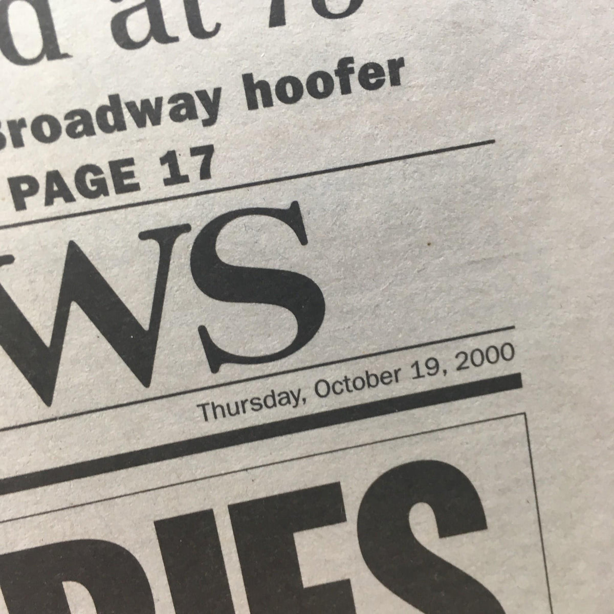 Close-up of the NY Daily News date, Thursday, October 19, 2000, featuring the headline about fans preparing for the Subway Series.