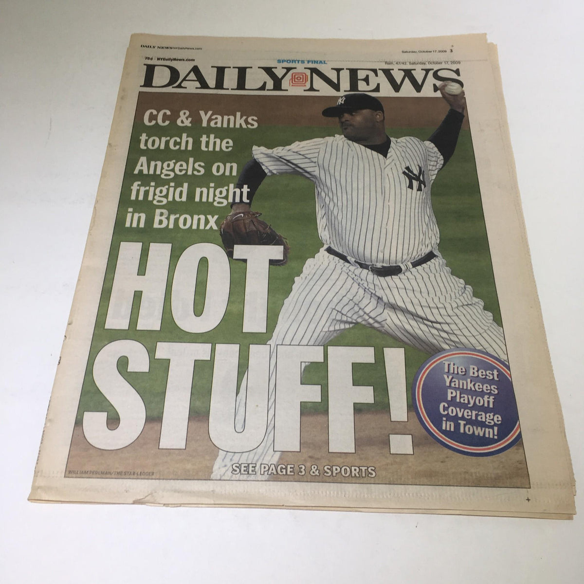 NY Daily News cover from October 17, 2009, featuring headline 'CC & Yanks Torch The Angels On Frigid Night In Bronx' with bold 'HOT STUFF!' text and visual of a New York Yankees player.