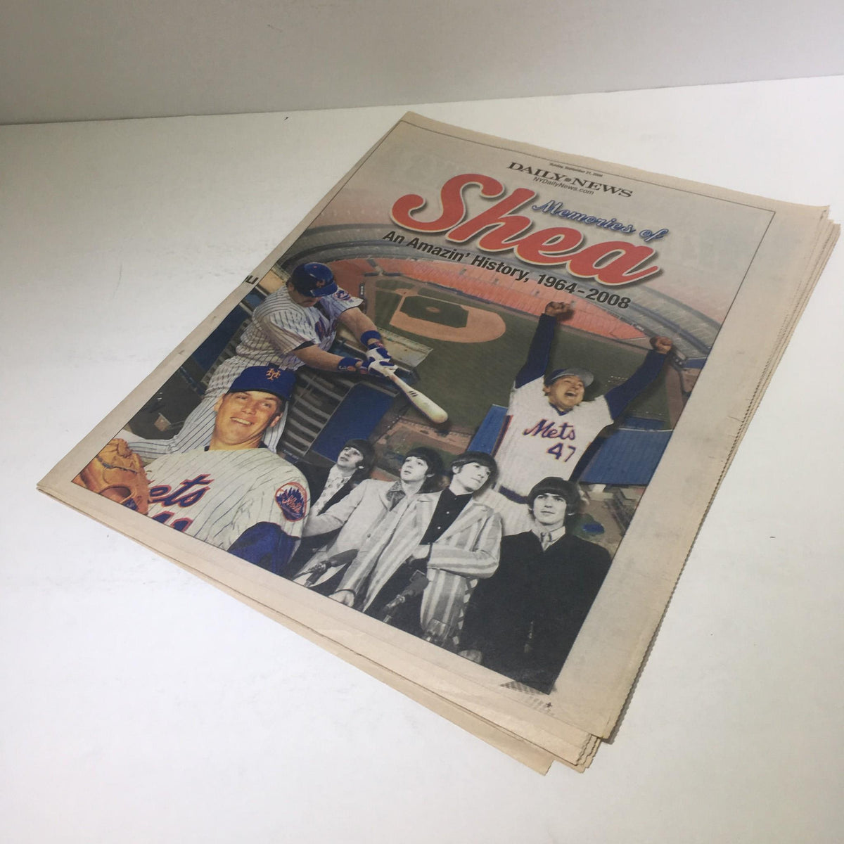 Another view of the front cover of the New York Daily News: Sept 21, 2008 - Memories of Shea, An Amazin' History, 1964-2008 capturing the stadium's history.