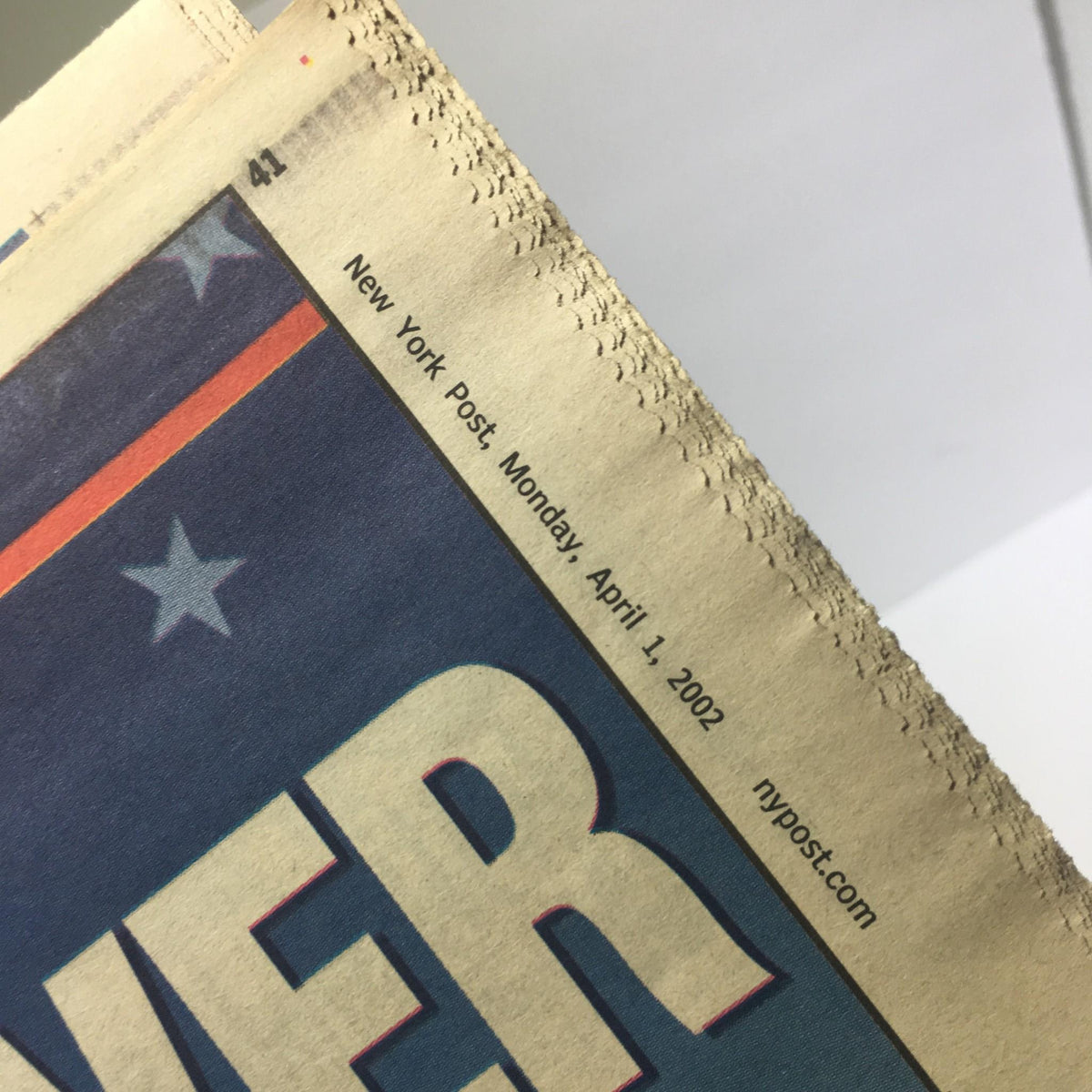 Top edge of the New York Post newspaper dated April 1, 2002, showcasing the publication's name and date.