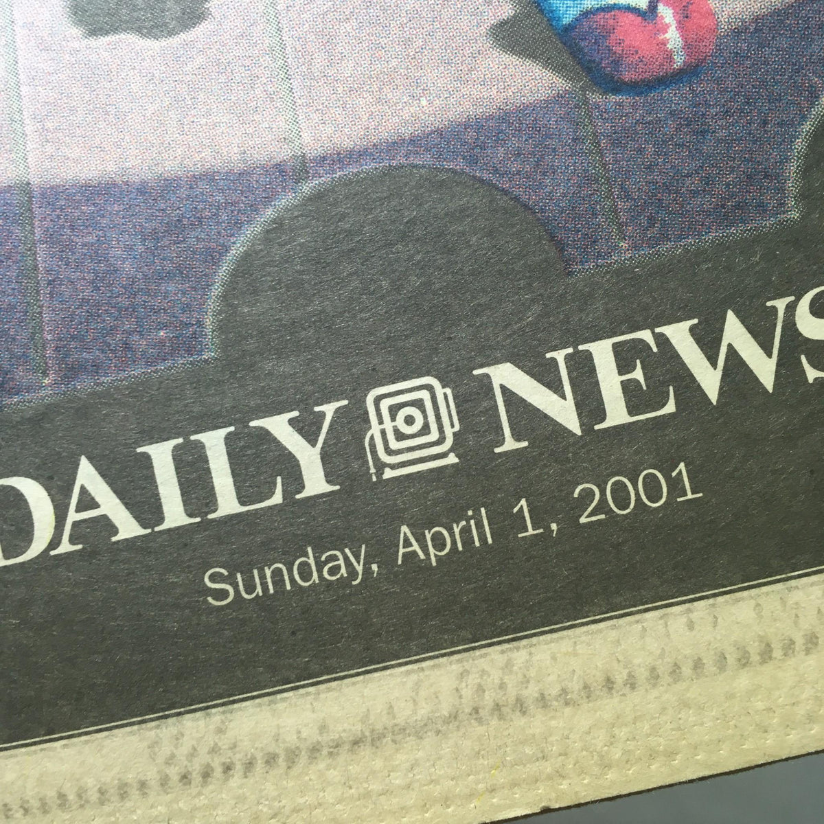 A close-up of the New York Daily News logo and publication date, showcasing 'Sunday, April 1, 2001' from the cover titled 'Encore'.