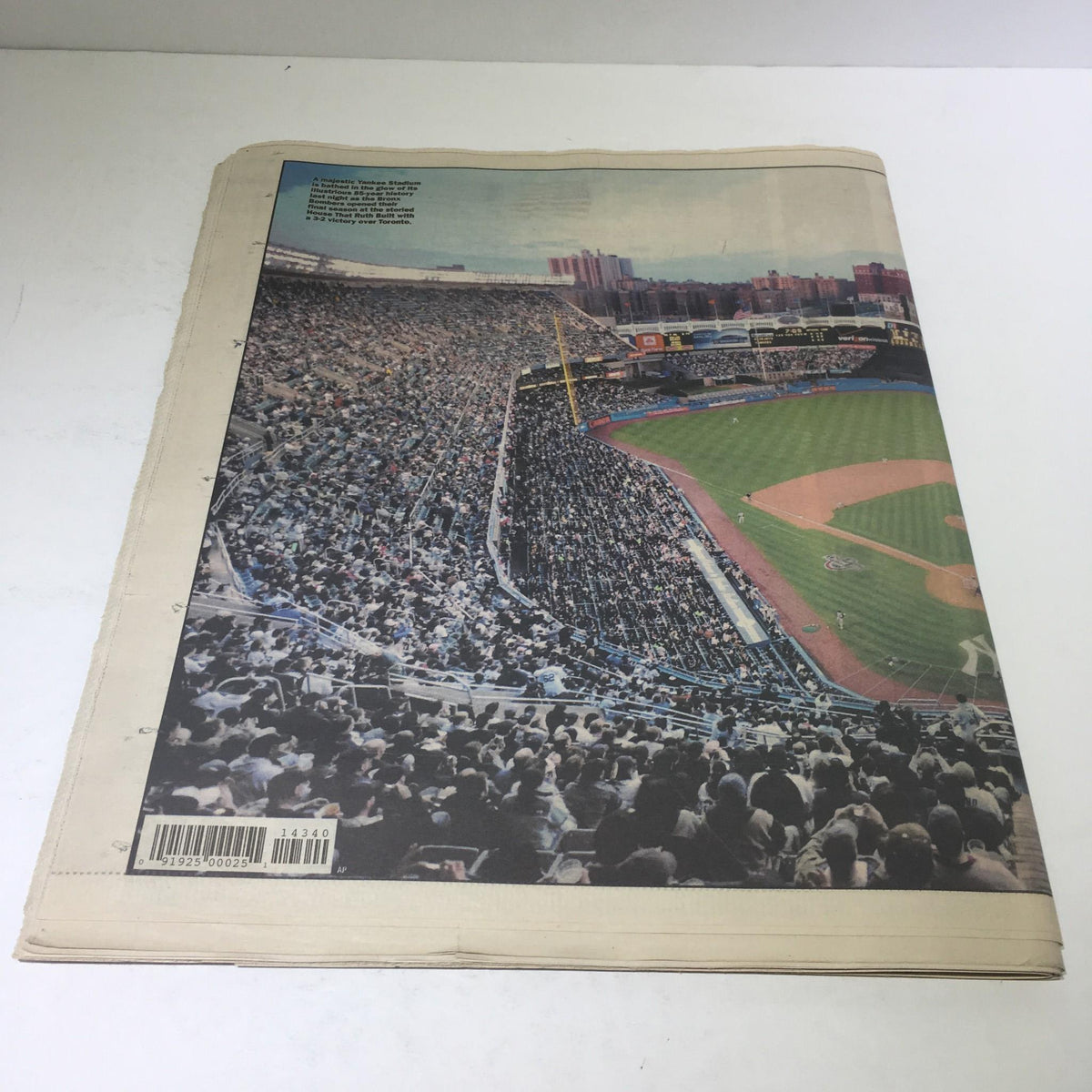 Image of a large crowd at a baseball stadium during the New York Post coverage of the April 2, 2008 final opening day titled 'History at the Stadium'.