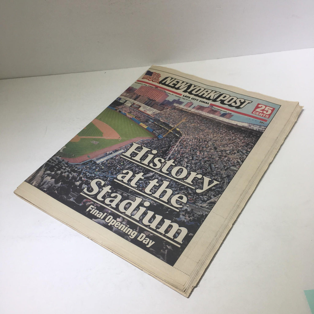 Cover of the New York Post featuring the title 'History at the Stadium' highlighting the final opening day with a view of the baseball field and spectators.