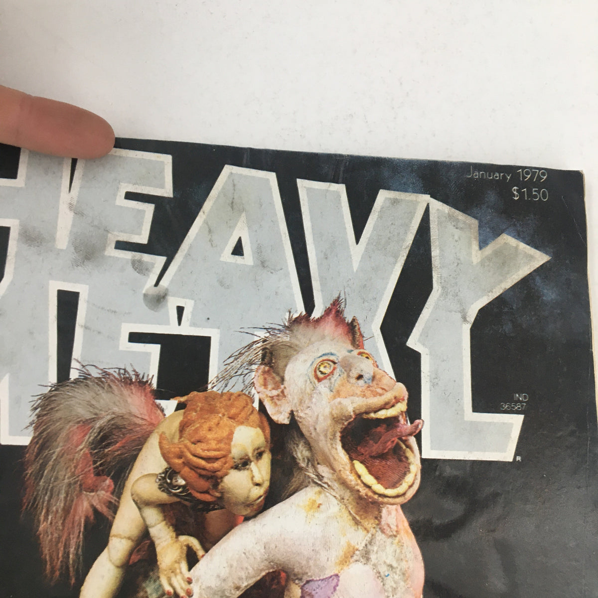 Close-up of the cover of Heavy Metal Magazine January 1979, highlighting the title and detailed fantasy figures, a notable work by Bilal.