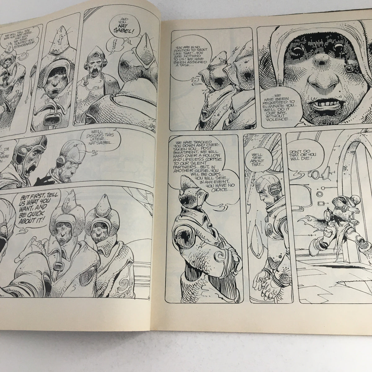 Heavy Metal Magazine January 1979 interior page featuring a dialogue scene with detailed illustrations by Bilal from the story 'The Ultimate Negotiation'.