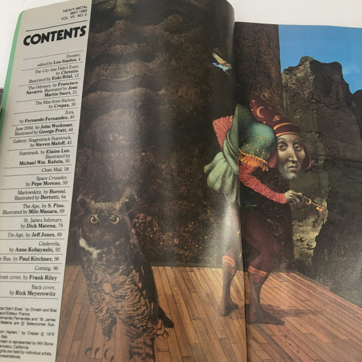 Contents page of Heavy Metal Magazine May 1983, featuring an eclectic mix of stories including 'The City that Didn't Exist' by Christin. Title: Heavy Metal Magazine May 1983 The City that Didn't Exist.
