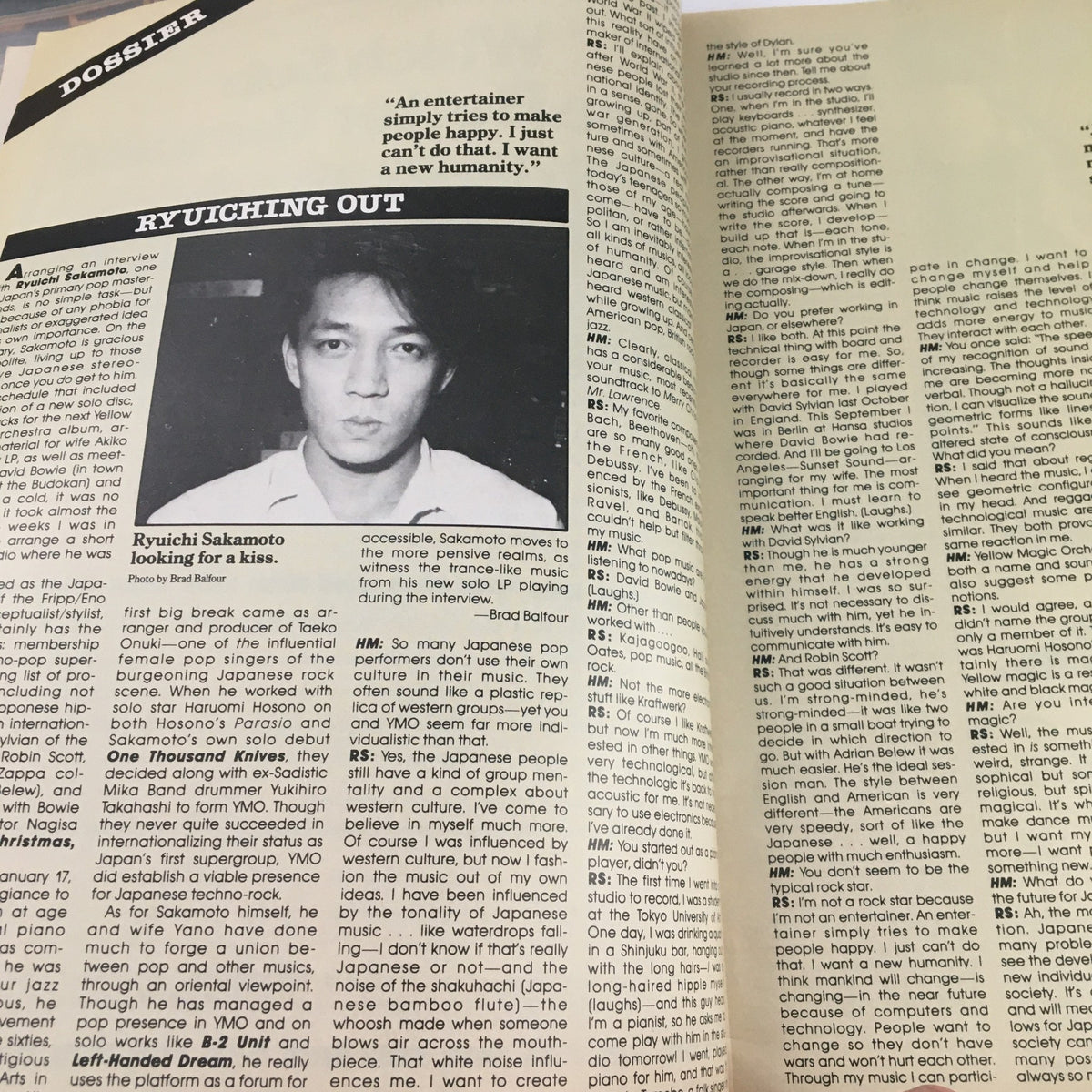 Ryuichi Sakamoto interview feature in Heavy Metal Magazine March 1984 showcasing his artistic perspective on entertainment and music.