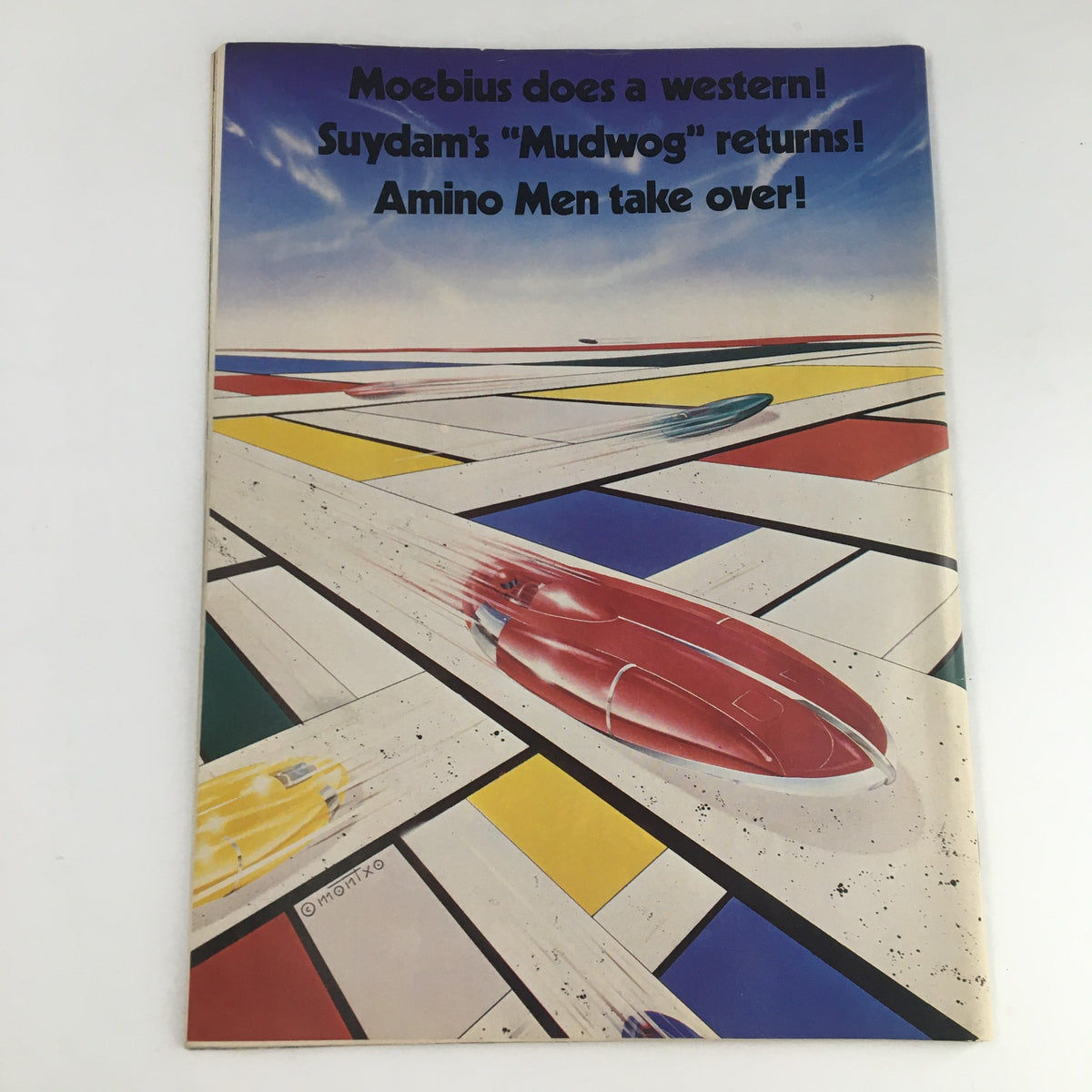 Cover of Heavy Metal Magazine December 1982 featuring an abstract design with bold colors and titles highlighting various featured stories.