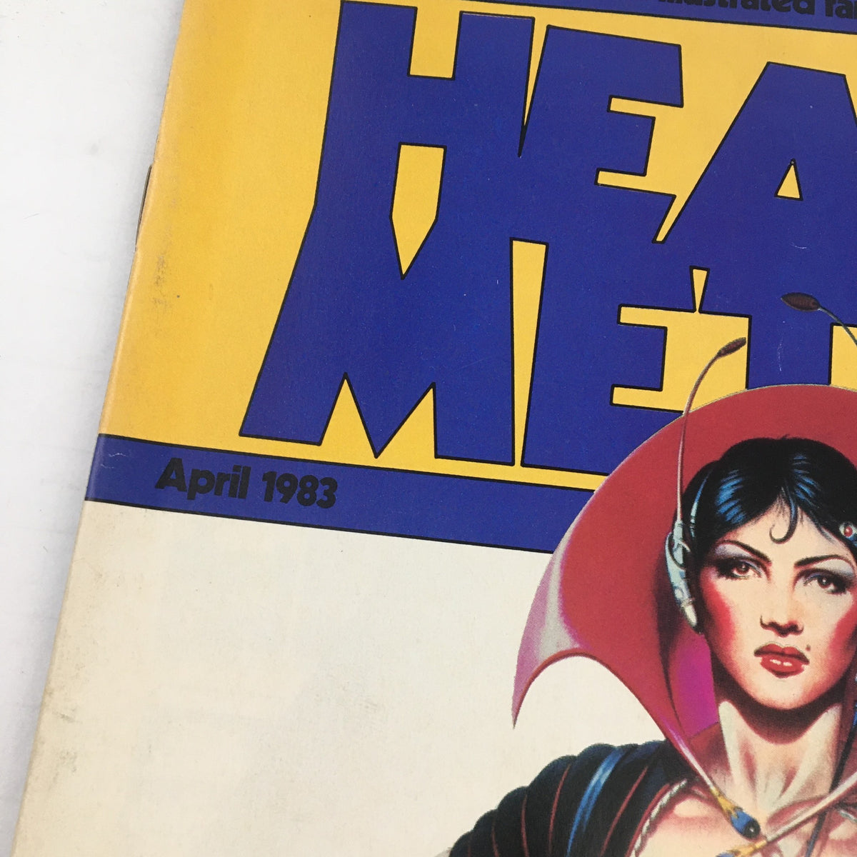 Close-up of the cover of Heavy Metal Magazine April 1983 highlighting the title and part of the illustrated female character wearing a cape.