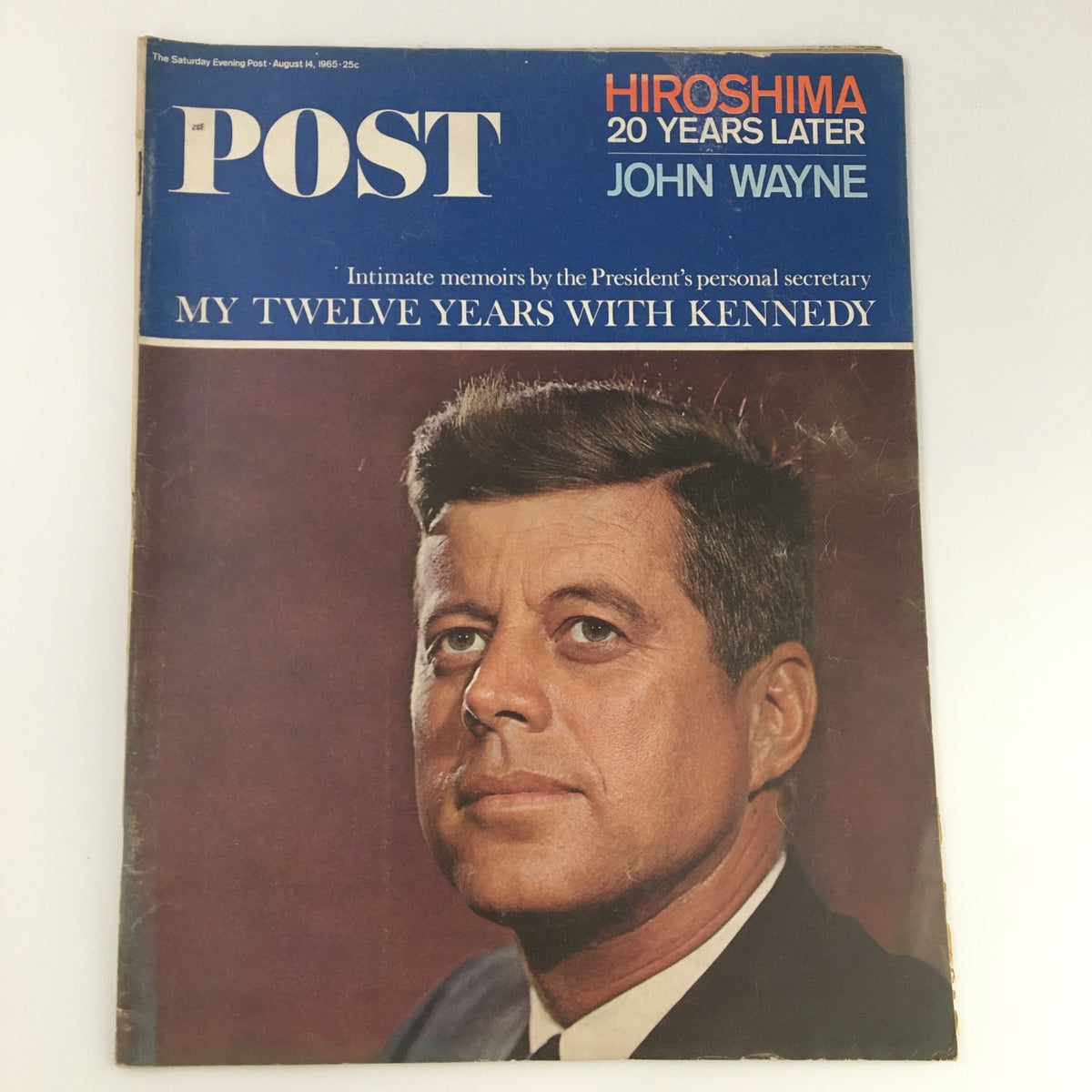 The Saturday Evening Post August 14 1965 cover featuring John F. Kennedy with a close-up portrait, showcasing the magazine's historical significance and notable articles.